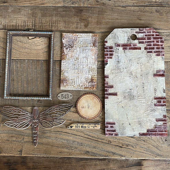 igirlzoe: tim holtz sizzix brickwork 3D embossing folder perspective moth switchlit seal